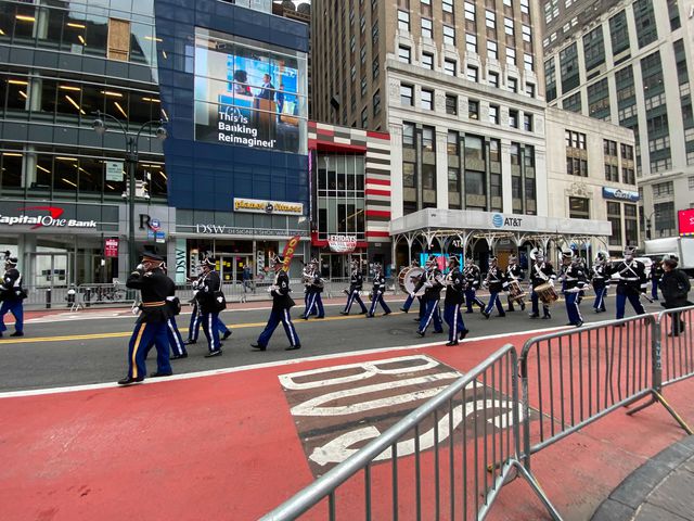 A photo of The West Point Marching Band performing on 34th Street on Wednesday